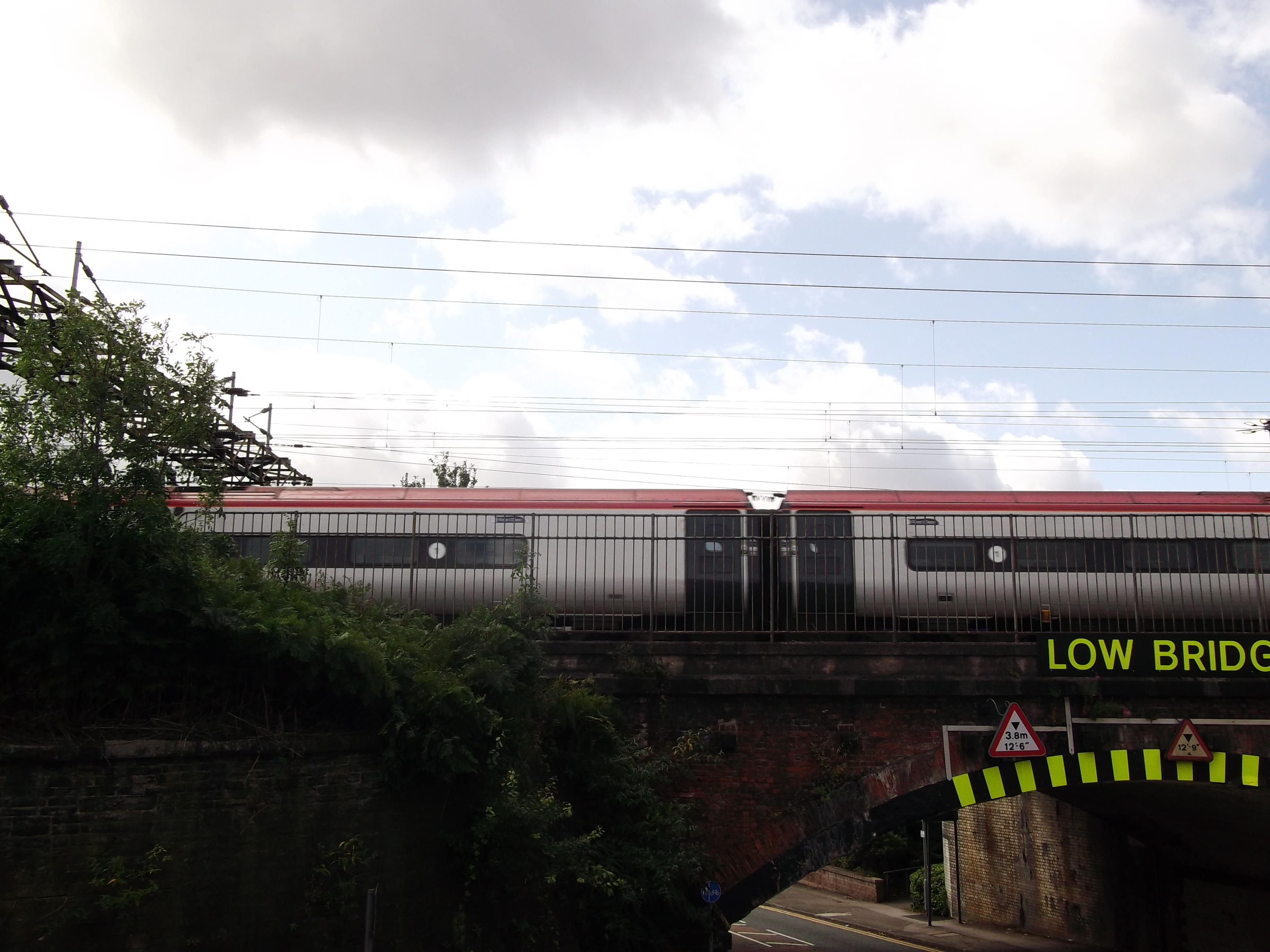 Virgin pendolino train crossing George's Road bridge to the viaduct