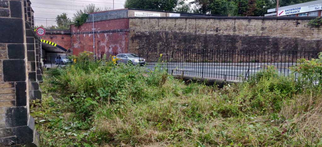 Georges Road is now visible from the side of the church, with the tall weeds removed