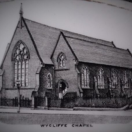 Close up of the Chapel etching on a white plate